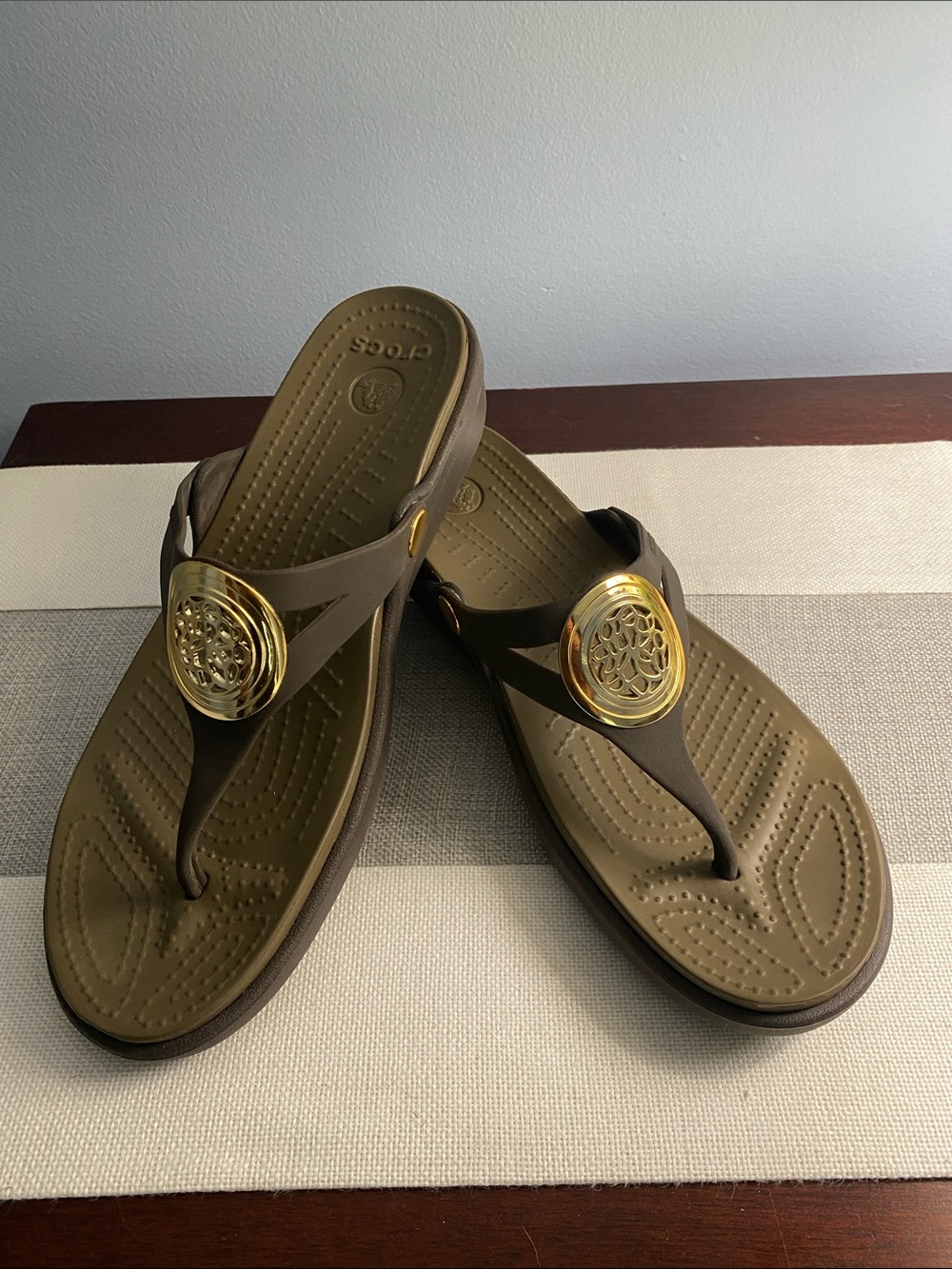 CROCS Olive Brown Sandals with Gold Medallion